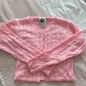 The ragged priest sweater